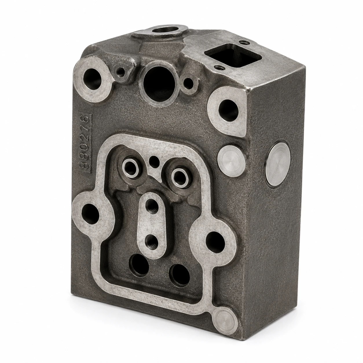 Precision cylinder head iron castings manufactured in Grey Iron and Ductile Iron for reliable engine performance, efficient heat dissipation, and OEM tractor applications.